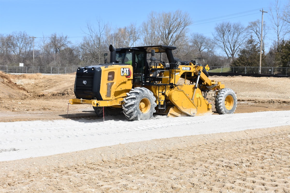 reclaimer driving across soil